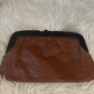 Vintage 100% leather clutch Mantessa